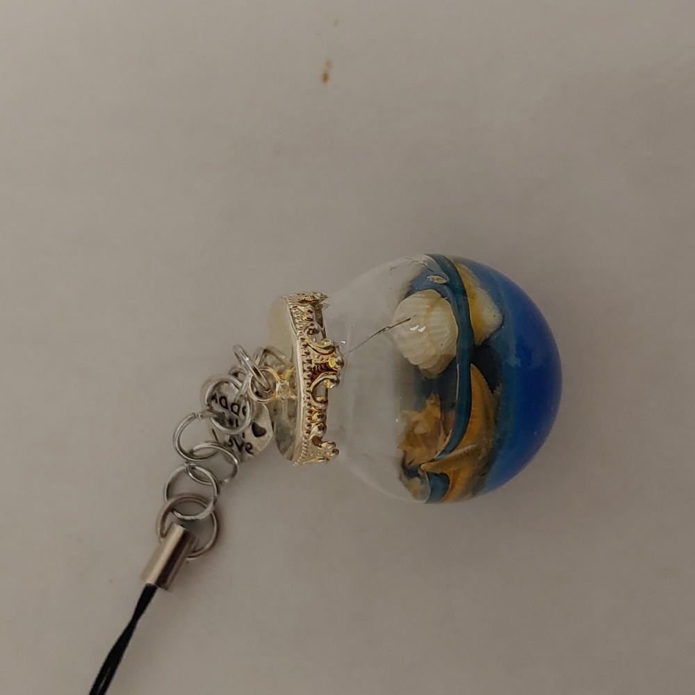 Cracked beach key/ phone chain
